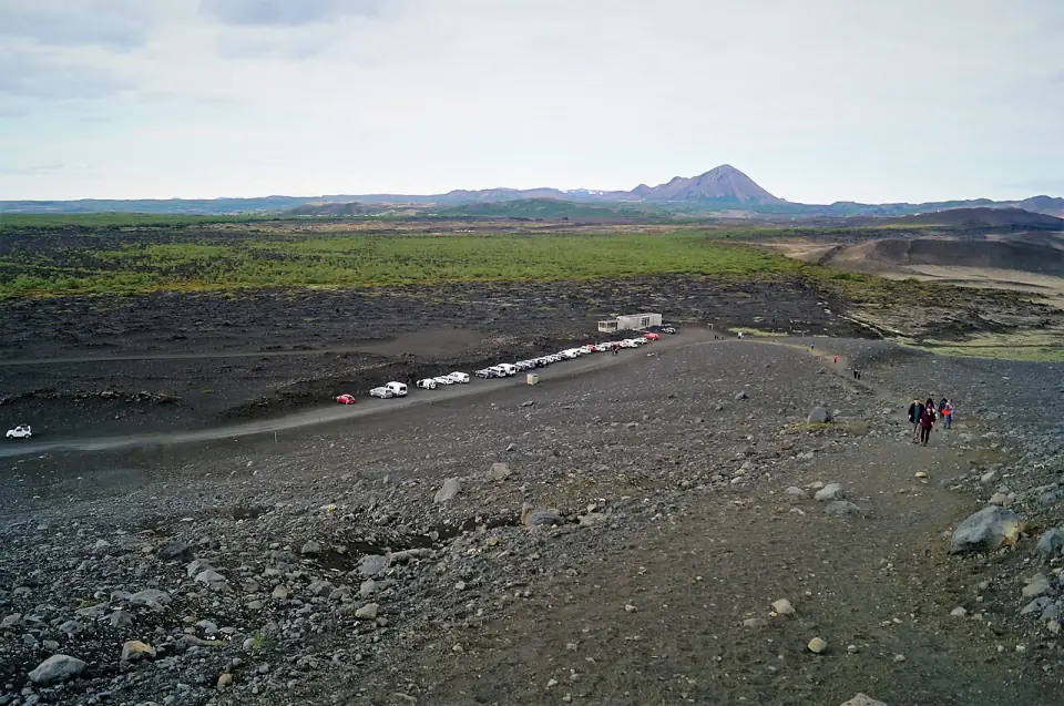 Parking and mountains view from trail to Hverfjall
